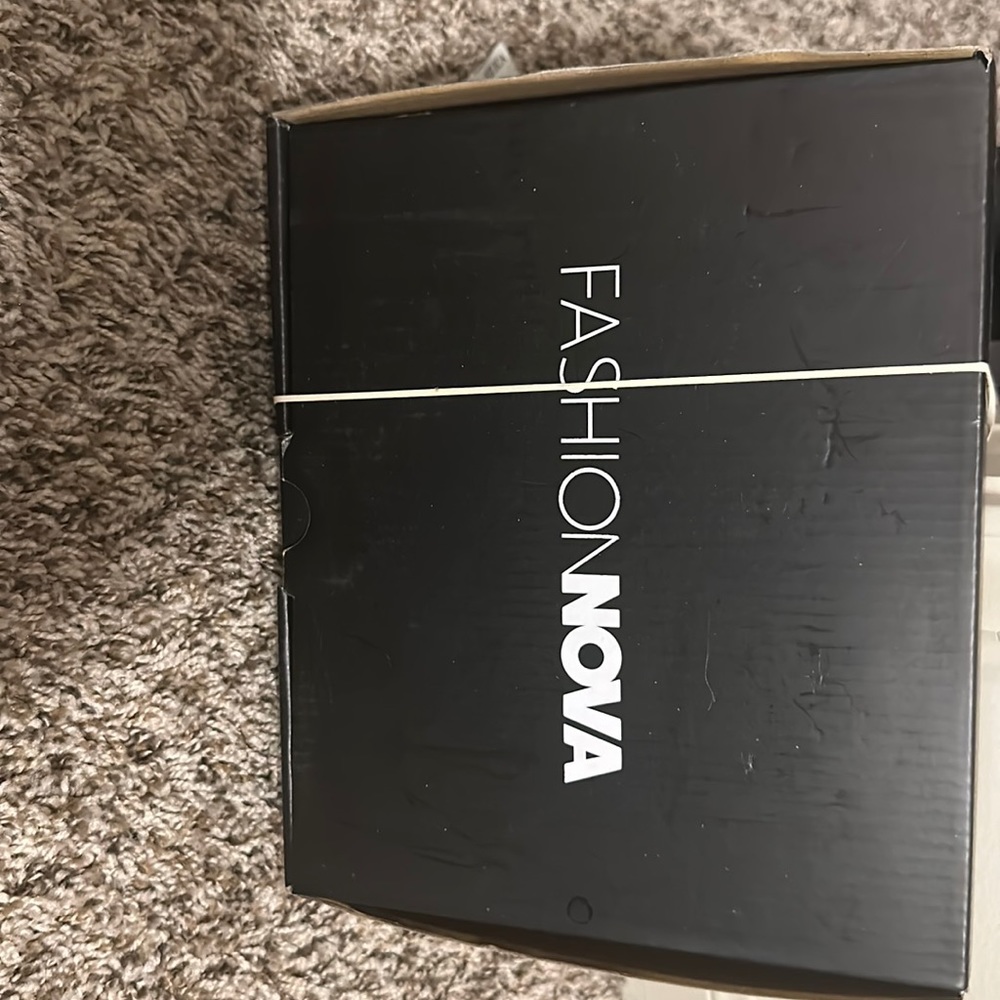 Cute wedge heel - never worn black with gold accents from Fashion Nova